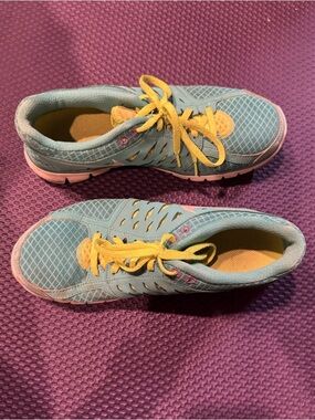 Nike Teal, Yellow & Pink Athletic Shoe Interior